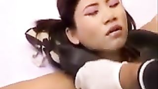 Mature man pooping on tied Japanese teen