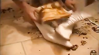 Young lady pours liquid shit on her naked body