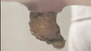 Beautiful constipated girl shitting a big one
