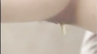 Beautiful constipated girl shitting a big one