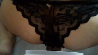 Sexy babe shitting in black lace panties