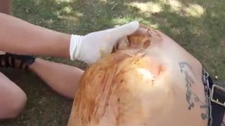 Fisting a chubby slut hard outdoor