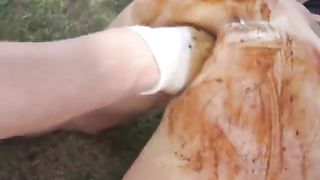 Fisting a chubby slut hard outdoor