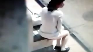 Brunette babe dropped a big turd in a bus station