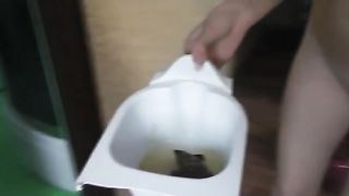 Blonde babe shitting in a white potty
