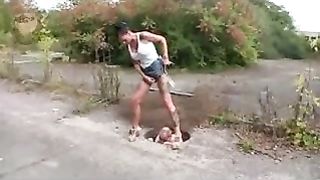 Sexy teen shitting on her male slave in public