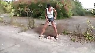 Sexy teen shitting on her male slave in public