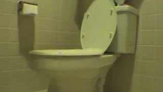 Muscular teen pooping in reverse position