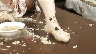 School girl puking on her feet