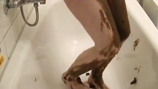 Smoking hot brunette rubbing shit on entire body