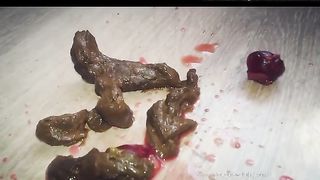 Hot blonde babe eating poop with cherries