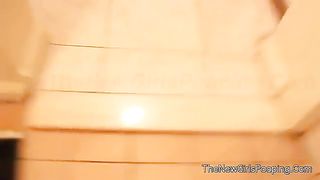 Sexy brunette pooping in doggy style