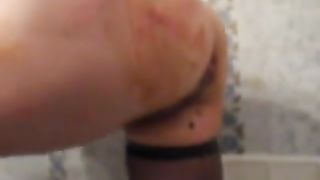 Horny milf smearing shit on her naked body