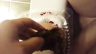 Horny milf smearing poop on her hairy pussy