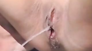 Blonde babe fingering her pussy while peeing