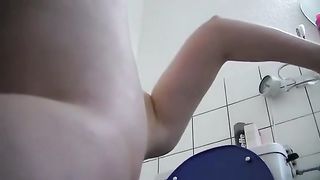 Blonde babe spreading butt cheeks while pooping