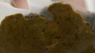 Shaved teen shitting on home made toilet