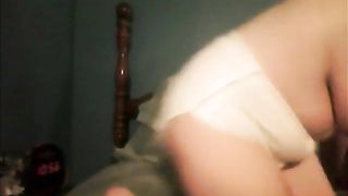 Mature baby pooping in her diaper and drinking her bottle