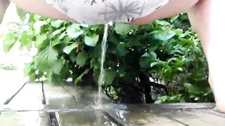 pissing on the patio in her underwear