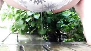 pissing on the patio in her underwear