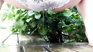 pissing on the patio in her underwear