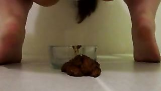 shitty woman defecates in conainters