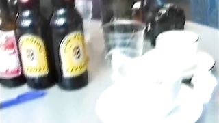 public pissing in a bar on the chair