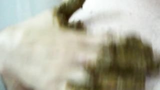 taking a dump and smearing his own shit over himself