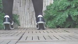 big poop with toilet paper on the wooden floor