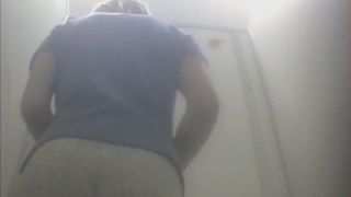 pooping and pissing woman on the toilet