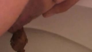 girl taking a shit filmed close up