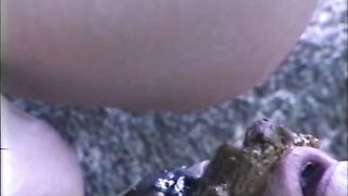 scat slave on the rocks pooped on his head