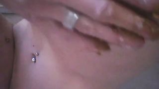 playing with her poop