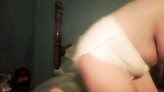 adult baby in nappies shitting and pissing herself