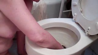 huge turd girl smears shit over herself