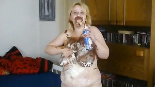 fat scat girl smearing whip cream over her body