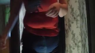 Busty babe smearing crap on her face