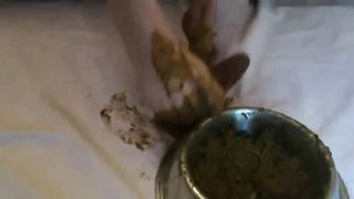 Chubby babe smearing crap on her feet