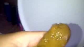 Dirty woman sucking a long turd