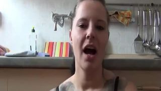 Sexy rocker girl rubbing shit on her face