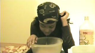 Beautiful Ebony Girl Puking in a Bowl
