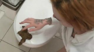Dirty babe eating poop in a public bathroom
