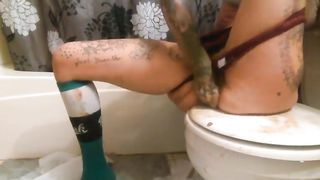 Beautiful blonde licking poop from toilet
