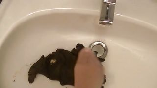 Huge turd dropped over toilet