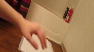Beautiful teen shitting on a white napkin