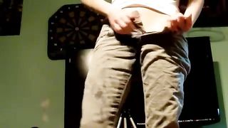 Sexy brunette peeing in her pants