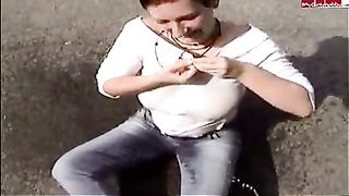 Clothed milf paid to pee outdoor