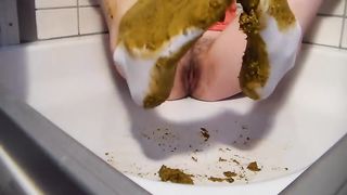Rubbing shit on her socks