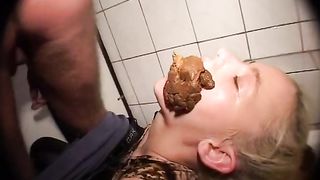 Rubbing poop on her face