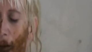 Blonde milf taking a scat bath